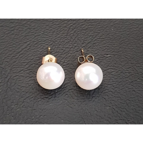 81 - PAIR OF PEARL STUD EARRINGS
in fourteen carat gold mounts and with nine carat gold butterflies