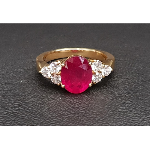 86 - IMPRESSIVE TREATED RUBY AND DIAMOND DRESS RING
the large central ruby measuring approximately 12.1mm... 