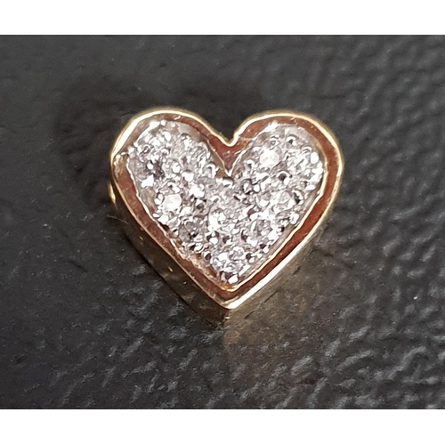 108 - PAVE SET DIAMOND HEART SHAPED PENDANT
in fourteen carat gold, 0.9cm wide