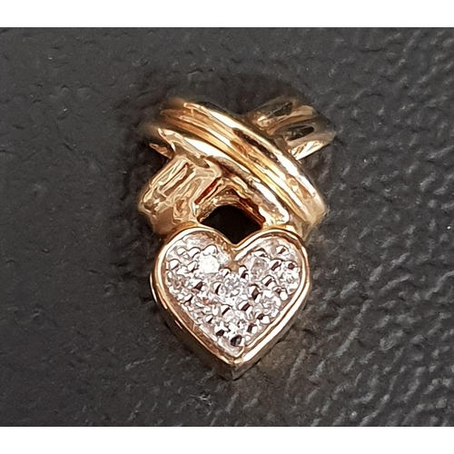 116 - PAVE SET HEART SHAPED PENDANT
the heart surmounted by a cross motif, in fourteen carat gold, 1.3cm h... 