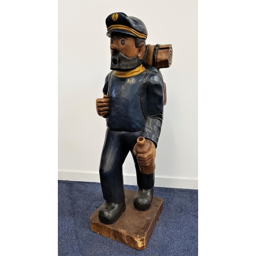 366 - CAPTAIN HADDOCK FROM THE ADVENTURES OF TINTIN
a large carved and painted teak figure, depicted with ... 