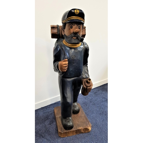 366 - CAPTAIN HADDOCK FROM THE ADVENTURES OF TINTIN
a large carved and painted teak figure, depicted with ... 