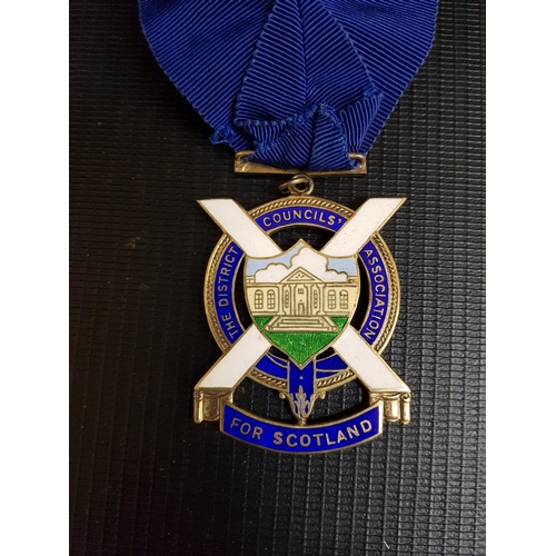 489 - THE DISTRICT COUNCILS ASSOCIATION FOR SCOTLAND
silver and enamel medal for the Honorary President wi... 