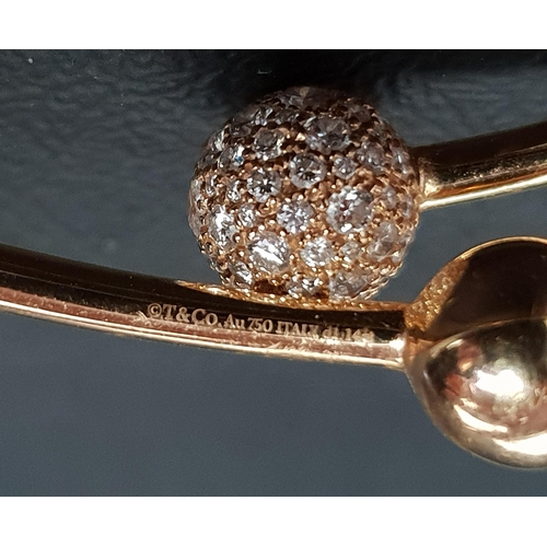 56 - TIFFANY & CO DIAMOND BALL BYPASS BRACELET
in eighteen carat rose gold, the diamonds totalling 1.14ct... 