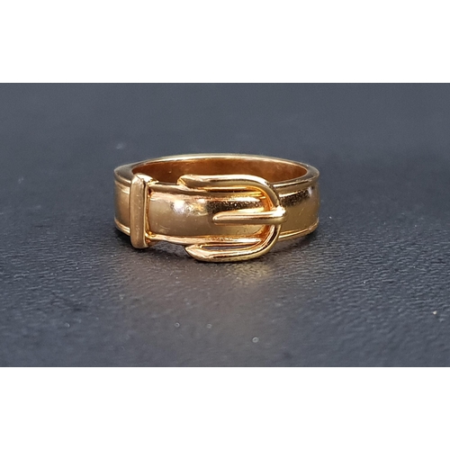 22 - HERMES GILT METAL BUCKLE DESIGN RING
the polished band with a buckle motif to the upper section, sta... 