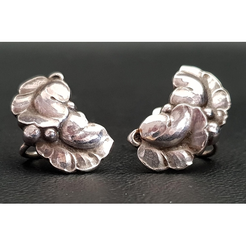 69 - PAIR OF GEORG JENSEN SILVER EARRINGS
of scrolling leaf design, design number 50A and with screw back... 