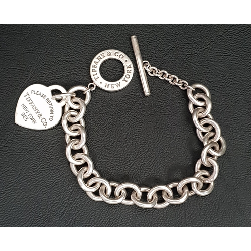 75 - TIFFANY AND CO. SILVER HEART TAG BRACELET
the heart tag engraved 'Please return to Tiffany & Co. New... 