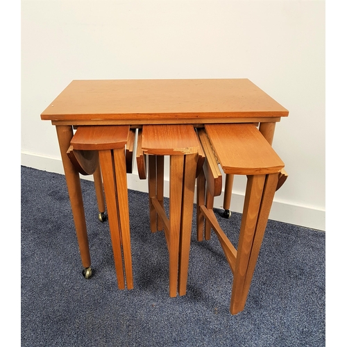 529 - RETRO TEAK OCCASIONAL TABLE
with a rectangular top on tapering supports with casters, 57cm high, wit... 