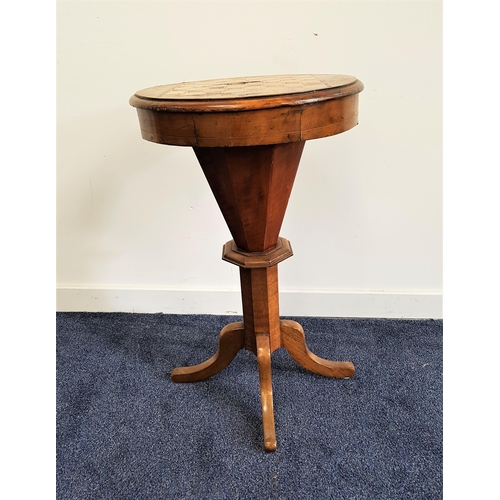 554 - VICTORIAN WALNUT TRUMPET GAMES AND SEWING TABLE
with a circular inlaid chess board top opening to re... 