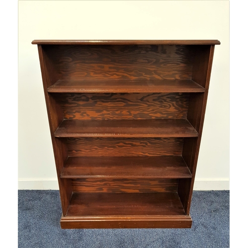 559 - MAHOGANY BOOKCASE
with a moulded top above four shelves, standing on a plinth base, 109.5cm x 82cm