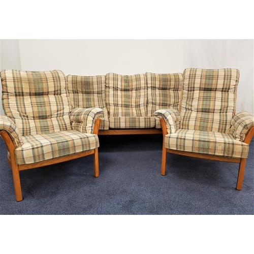 621 - ERCOL ELM SAVILLE THREE PIECE SUITE
with a three seat sofa, 187cm wide, and two armchairs, all with ... 