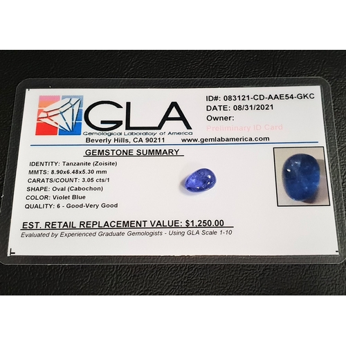 18 - CERTIFIED LOOSE TANZANITE
the oval cabochon gemstone weighing 3.05cts, with GLA gemological report s... 