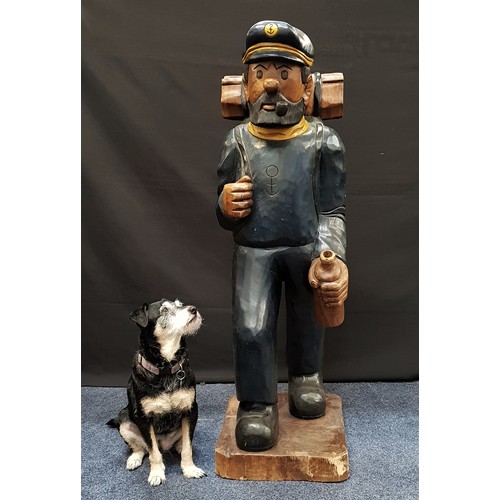 366 - CAPTAIN HADDOCK FROM THE ADVENTURES OF TINTIN
a large carved and painted teak figure, depicted with ... 