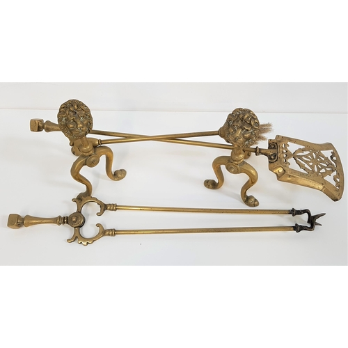 363 - PAIR OF BRASS ANDIRONS
with lion masks and shaped supports, together with a brass companion set of a... 