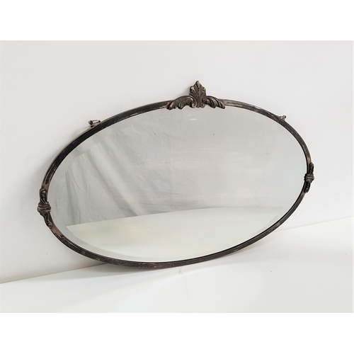 531 - OVAL METAL FRAME WALL MIRROR
with a bevelled plate, 69cm wide