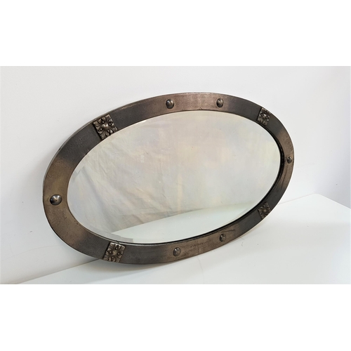 534 - OVAL METAL FRAME WALL MIRROR
with a bevelled plate, 85cm wide