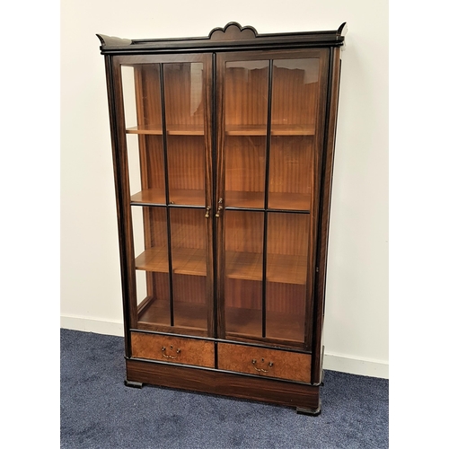 543 - 1930s COROMANDEL DISPLAY CABINET
with a three quarter gallery top with a carved fan detail above two... 