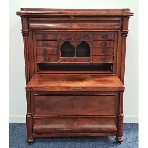 547 - WILLIAM IV MAHOGANY ESCRITOIRE
with a moulded top above a cushion frieze drawer flanked by turned co... 