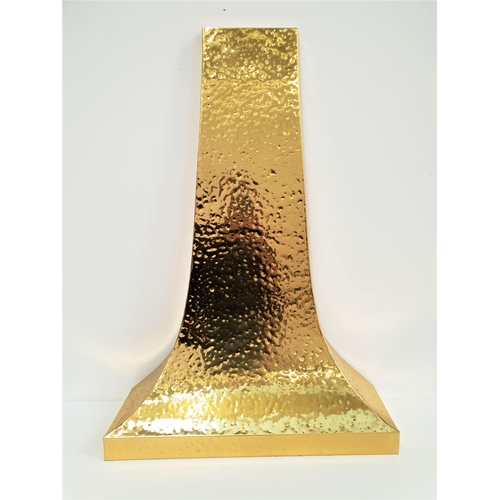 572 - HAMMERED BRASS CHIMNEY PIECE
of shaped tapering form, 115cm x 81cm