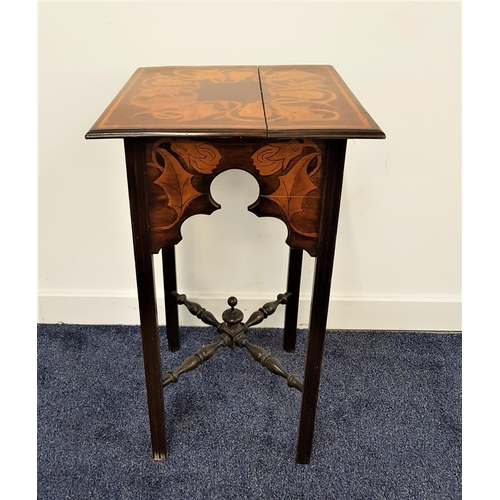 584 - EDWARDIAN MAHOGANY SIDE TABLE
the square top decorated with holly leaves above a shaped four sided f... 