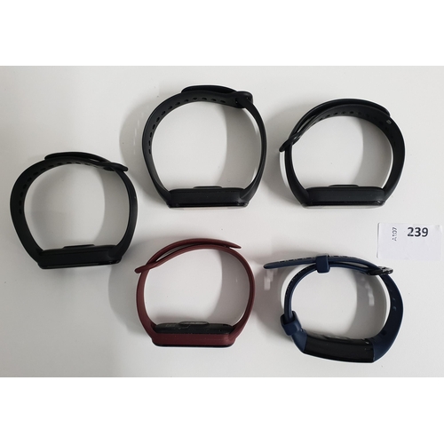 239 - SELECTION OF FIVE FITNESS TRACKERS 
comprising of four Mi fitness trackers and one generic fitness t... 