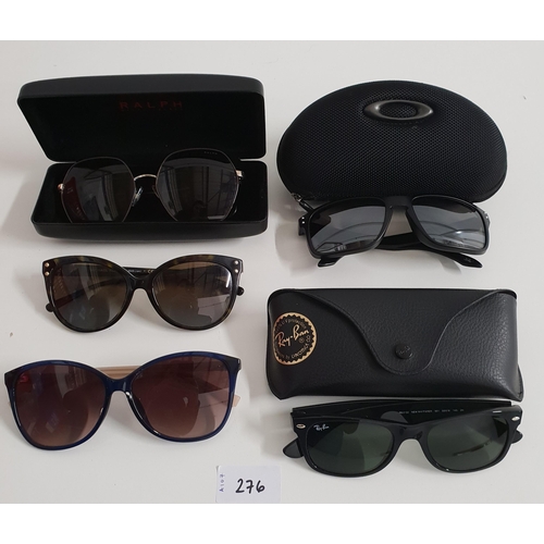 276 - FIVE PAIRS OF DESIGNER SUNGLASSES
comprising Ralph Lauren, Oakley, Ray-Ban, Ted Baker and Michael Ko... 