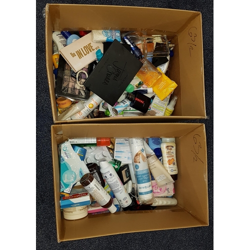 63 - TWO BOXES OF NEW AND USED TOILETRY ITEMS
including: Chanel, Simple, Nivea, Malibu, Prada, Garnier, L... 