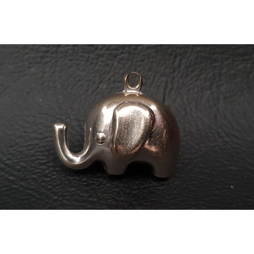 12 - EIGHTEEN CARAT WHITE GOLD ELEPHANT PENDANT/CHARM 
approximately 2.1 grams and 2cm long