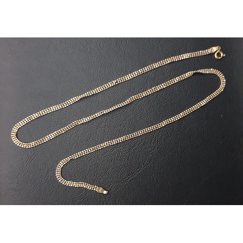 38 - EIGHTEEN CARAT TWO TONE WHITE AND YELLOW GOLD THREE STRAND NECK CHAIN 
comprising two white gold and... 