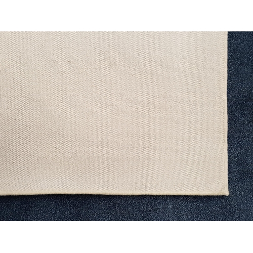 617 - LARGE CREAM GROUND RUG
with a woven edge, 350cm x 300cm