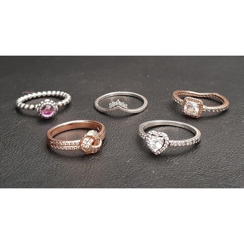 6 - SELECTION OF FIVE PANDORA RINGS 
comprising a Square Sparkle ring, a Tiara Wishbone ring, an Elevate... 