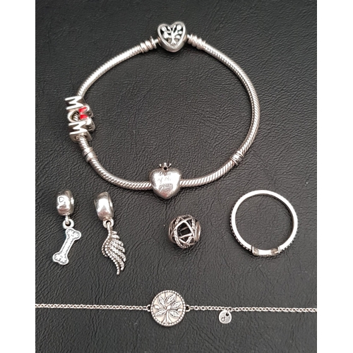 18 - SELECTION OF PANDORA JEWELLERY
comprising a silver Pandora Moments Family Tree heart clasp bracelet,... 