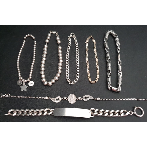 36 - SELECTION OF SILVER BRACELETS 
including an identity bracelet, a CZ set bracelet, beaded bracelets a... 
