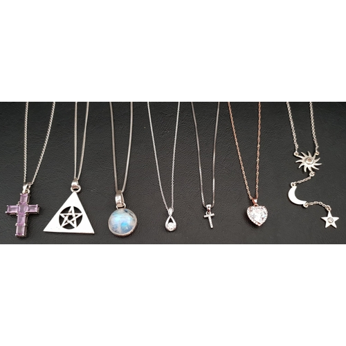 45 - SELECTION OF SILVER PENDANTS ON CHAINS
including an amethyst cross, circular moonstone and CZ set ex... 
