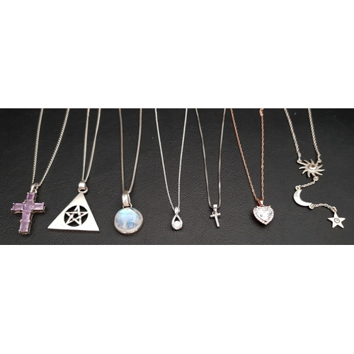 45 - SELECTION OF SILVER PENDANTS ON CHAINS
including an amethyst cross, circular moonstone and CZ set ex... 