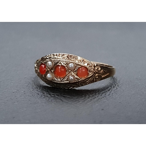 90 - CORAL AND SEED PEARL CLUSTER RING 
the three round cabochon coral sections interspersed with four se... 