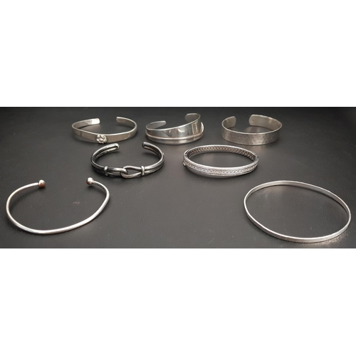 229 - SELECTION OF SEVEN SILVER BRACELETS
including bangles and cuffs, CZ set and textured designs (7)