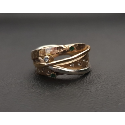 96 - UNUSUAL DIAMOND AND GEM SET RING
formed of different gold bands, one with flush set diamonds and ano... 