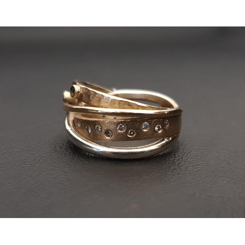 96 - UNUSUAL DIAMOND AND GEM SET RING
formed of different gold bands, one with flush set diamonds and ano... 