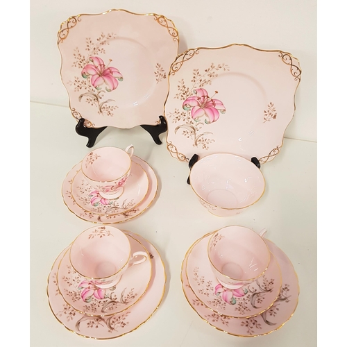 288 - TEN PIECE TUSCAN BONE CHINA TEA SET
with a lily design on a pink ground with gilt highlights, compri... 