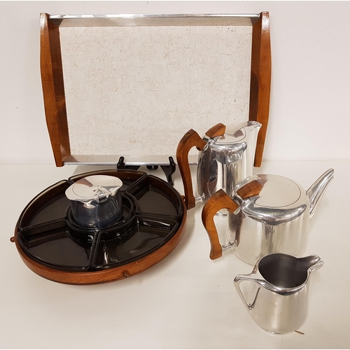 345 - NEWMAID STAINLESS STEEL TEA SERVICE
comprising a tea pot, hot water jug, milk jug, sugar bowl and tr... 