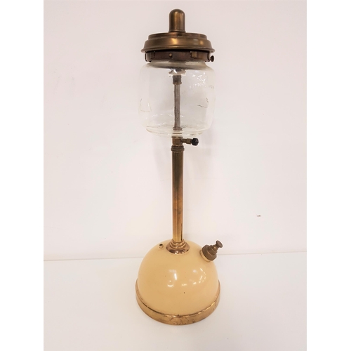 370 - TILLEY TL136 PRESSURE LAMP
with a white metal domed reservoir and brass column with a glass shade, 5... 