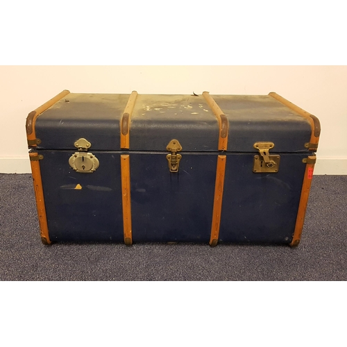 564 - VINTAGE TRAVEL TRUNK
with wooden banding and side carrying handles, 47.5cm x 92cm x 53cm