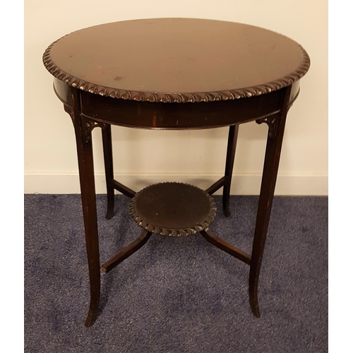 573 - EDWARDIAN CIRCULAR MAHOGANY OCCASIONAL TABLE
standing on tapering supports united by a circular unde... 