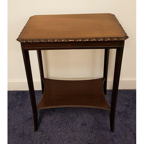 592 - MAHOGANY OCCASIONAL TABLE
with a rectangular top standing on tapering supports united by a shaped un... 