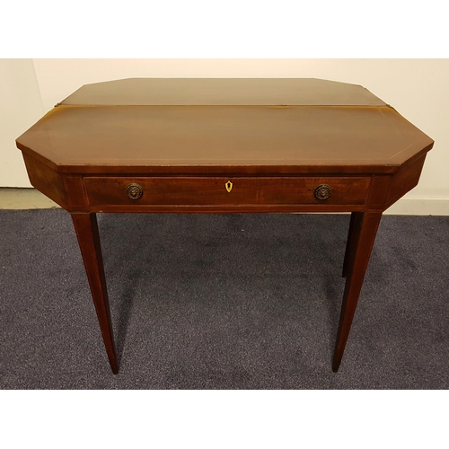 609 - 19th CENTURY MAHOGANY TEA TABLE
with a shaped and crossbanded foldover top with canted corners above... 