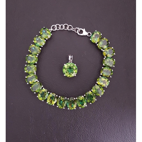 113 - GREEN GEM SET BRACELET AND MATCHING PENDANT
the bracelet with twenty oval cut gemstones, the pendant... 