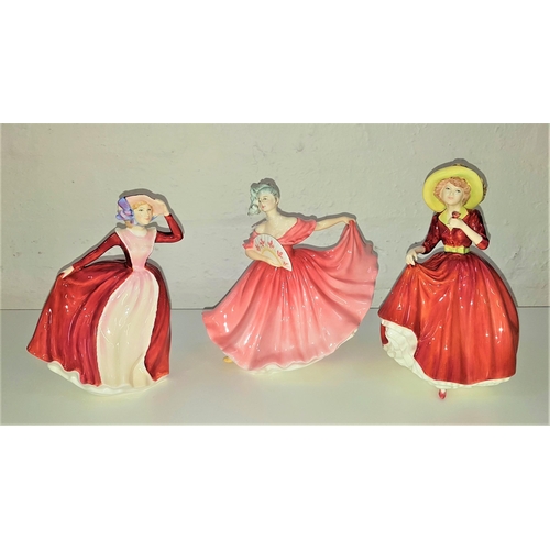 268 - THREE ROYAL DOULTON FIGURINES
Elaine, HN3307, 19.5cm high, A Single Red Rose, HN3376, 22cm high, and... 