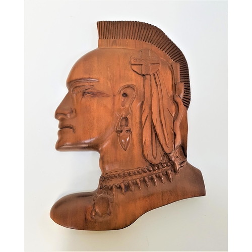 330 - TEAK CARVING
of a native American in profile, 43.5cm high