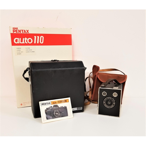 343 - PENTAX AUTO 110 SLR CAMERA OUTFIT
comprising the camera, auto flash unit, winder, 18mm, 24mm and 50m... 